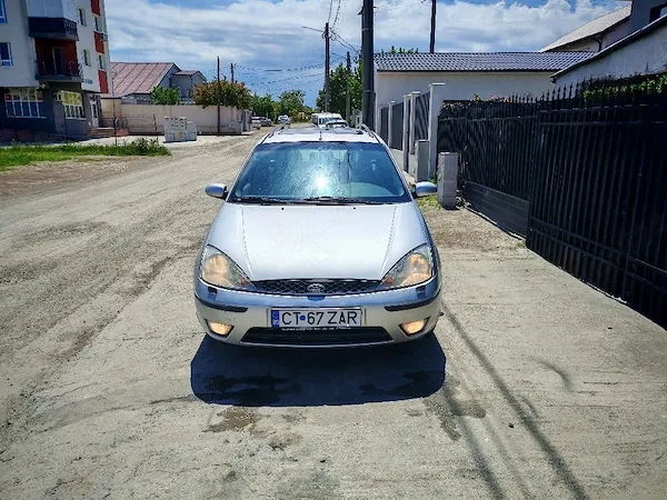 Ford focus benzina 1.6 impecabil 759 e .